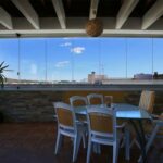 Ventajas de acristalar una terraza con cortinas de cristal